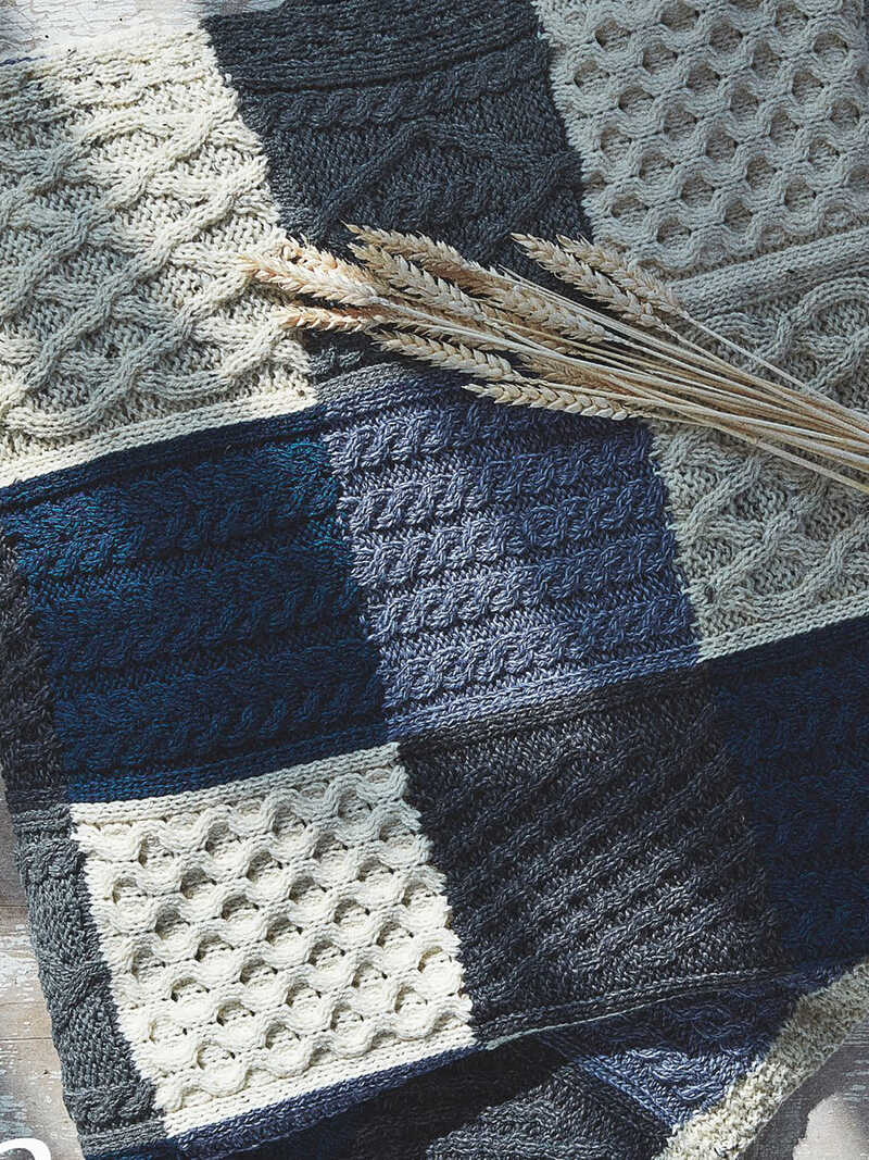 Irisches Wollplaid mit Aran-Strickmuster