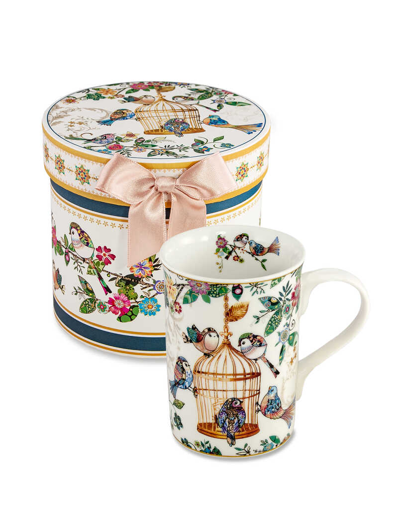 Becher mit Vogelkfig-Motiv