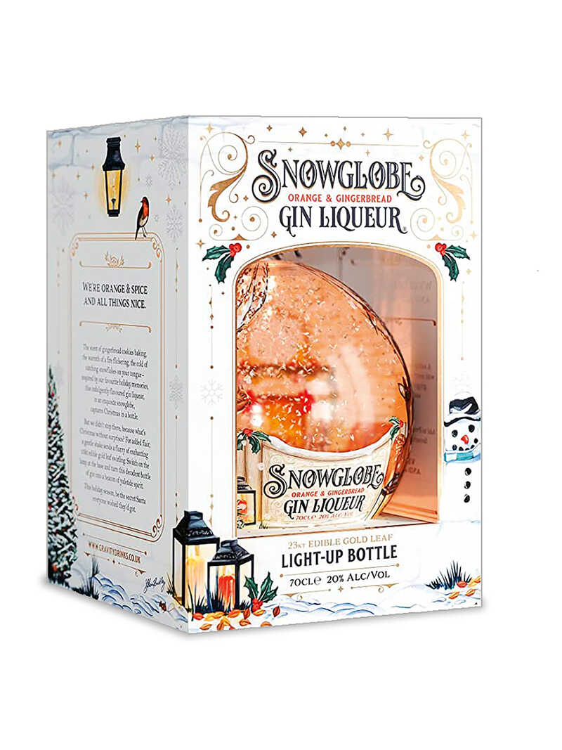 Gin-Likr in Schneekugel mit essbarem Blattgold