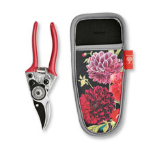 Rote Gartenschere mit Grtelhalter mit Blumen