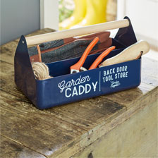 Blaue Metallbox mit Holzgriff